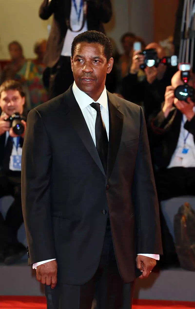 Denzel Washington attends the premiere of The Magnificent Seven