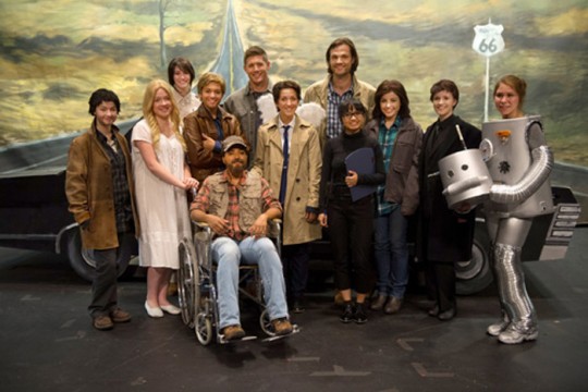 Pictured:(back-row-center-L-R) Jensen Ackles as Dean and Jared Padalecki as Sam surrounded by cast of Supernatural The Musical Photo Credit: Diyah Pera/ The CW