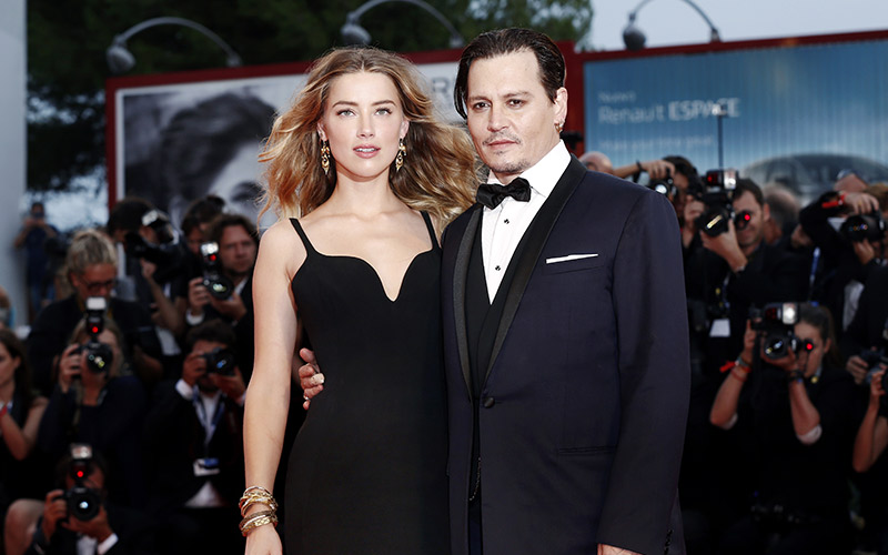 Johnny Depp and Amber Heard attend Black Mass premiere