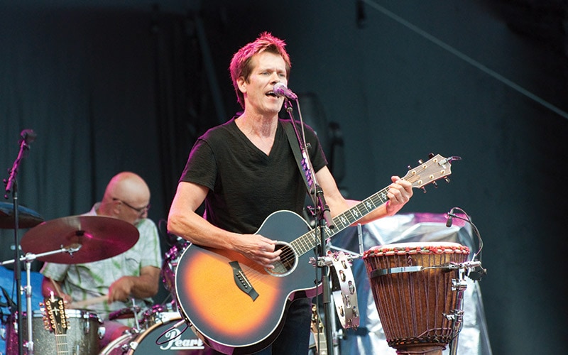 Kevin Bacon performs with the Bacon Brothers