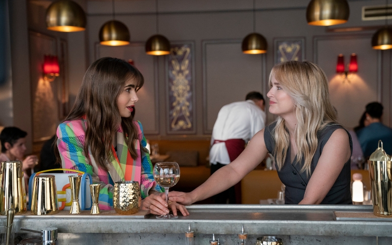 Lily Collins as Emily, Camille Razat as Camille